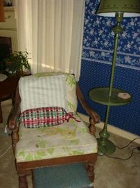 Wooden chair with cushions. Green lamp