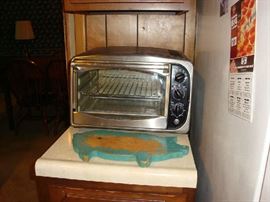 Countertop oven and turquoise cutting board