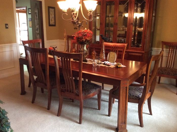 Oh my goodness! This Arts & Crafts Collection Mission Style dining room set is in IMPECCABLE condition! We have the the table and 8 chairs, china cabinet and granite heat resistant top server!  
