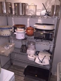 Lots of kitchen appliances and Cooking Untensils