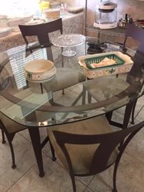 Glass kitchen Table with 4 chairs olive green covered seat and with plastic seat covers