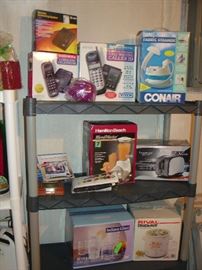 various kitchen and other small appliances- most new in box