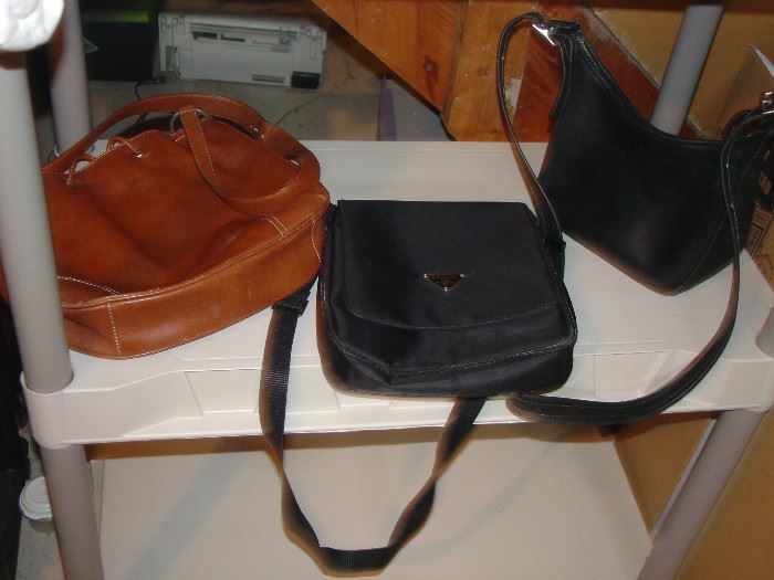 designer purses- Coach, Prada, gucci and Fossil available plus a few more brands