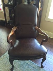 Brown leather arm chair with Queen Anne legs
