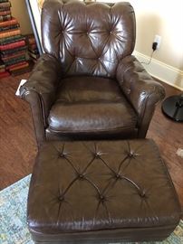 Brown leather, tufted fireside chair with matching ottoman