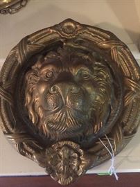 Metal lion door knocker 
