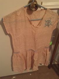 Antique child under shirt