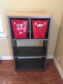 Wood top metal side and shelves bookcase. I am including two red metal buckets.