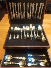 63-Piece set of Reed & Barton "French Renaissance" sterling silver flatware, 4 Gorham Strausbourg soup spoons, 4 silver plated dessert forks, 5 sterling seafood forks, all in a mahogany silver chest.