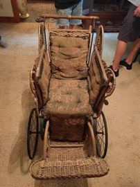 Antique wicker baby buggy
