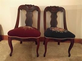 Another cute pair, with needlepointed seats.