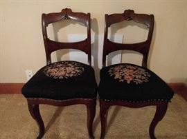 Love all the needlepoint work on these chairs. I wouldn't do it.