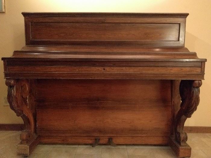 Now THIS is a piano! It is rosewood and manufactured by the Pleyel Wolff & Cie, France. The serial# is 66609, which dates it between 1870-1880. Its twin sits in the Cabildo museum in New Orleans, LA.