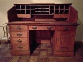 WONDERFUL 1880's oak desk, bought from Kennedy Schultz, of the Church of Religious Science, in the 1980's. Has lot's 'o charm and compartments, more importantly, it breaks down into five sections for easy moving.