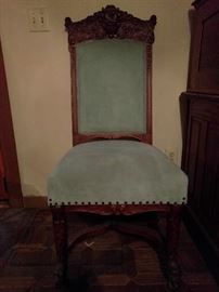 Very nicely carved oak chair, with baby blue velvet upholstery, beautifully carved dolphin legs.