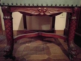 Detail of the carved dolphin legs.