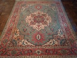 Persian Heriz design rug, 100% wool face, handwoven, measures 7' 10" x 9" 6".