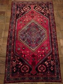 Vintage hand woven Persian Viss rug, 100% wool face, measures 4' x 7'.