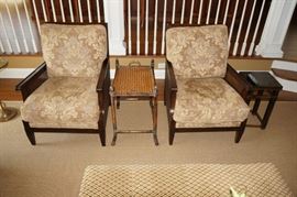 Pair wooden armchairs with rattan back and sides,
upholstered cushions, marked
Acquisitions by Henredon, $600/pair.