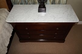 Pair, fruitwood, white
marble-top night stands, Grange,
marked made in France, $800/pair.