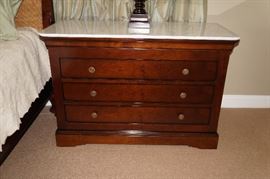 Pair, fruitwood, white
marble-top night stands, Grange,
marked made in France, $800/pair.