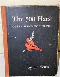 “The 500 Hats of Bartholomew Cubbins” by Dr. Seuss