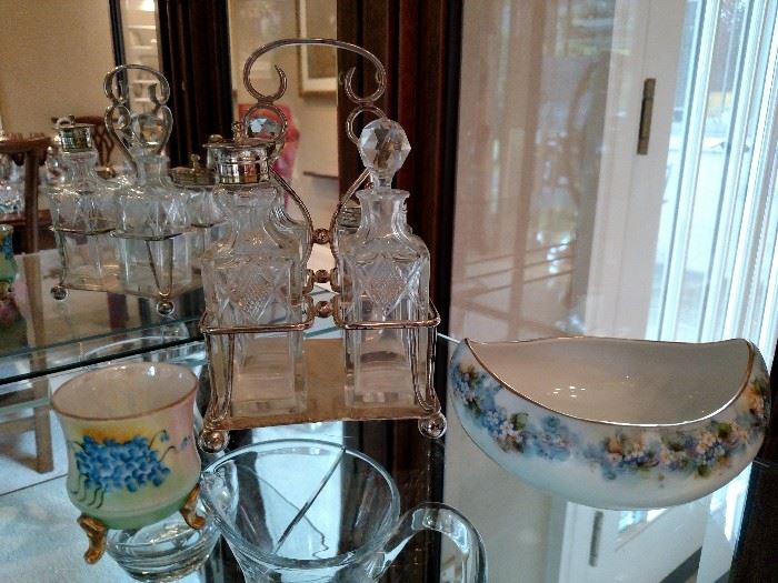Silverplate and crystal cruet, porcelain items