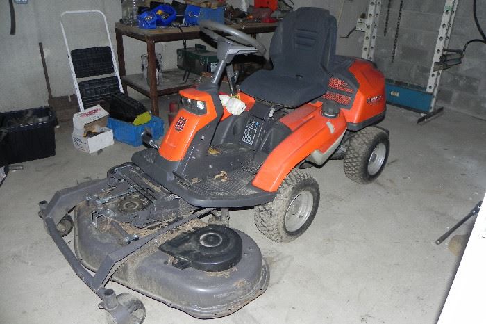 Purchased new old stock 5 months ago ! 2015 Husqvarna R 322T AWD Tractor with lawm mower and snow blower attachments !  Paid $6900.00 Take her home for $4500.00