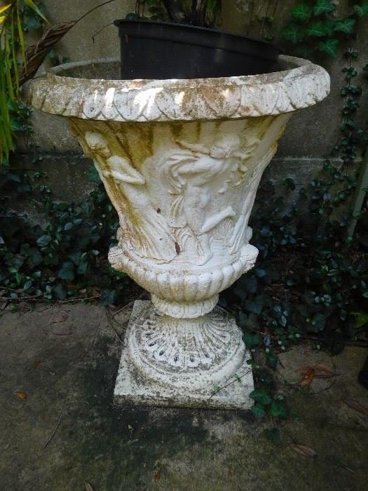 One of two ground marble urns