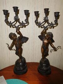 Pair of elegant bronze candelabras