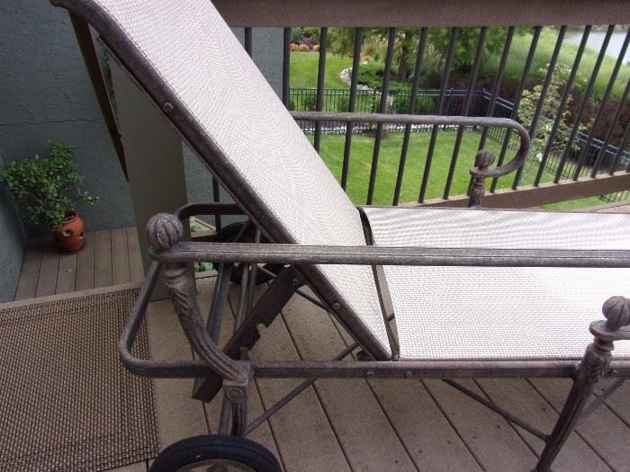One of two patio lounge chairs - Details and wheels
