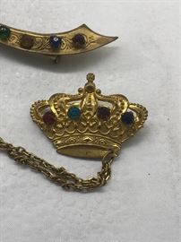 Sword and crown sweater pins