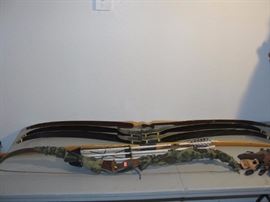 4 really nice bows. Have arrows too!