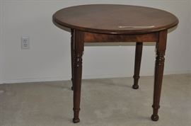 American Victorian round walnut table on four turned legs 36” diameter circa 1860-1870 