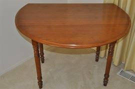 American walnut oval drop leaf table circa 1860-1870