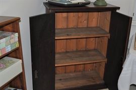 Antique cabinet with shelves, doors with locking mechanism