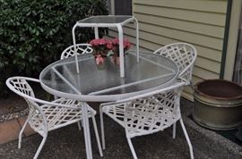Round glass-topped patio table with four chairs, small square glass topped table, Molbak's planter