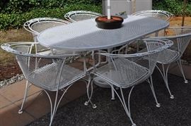 Woodard Briarwood vintage wrought iron oval patio table with six chairs, patio umbrella, umbrella weighted stand, 2-piece pottery planter surround