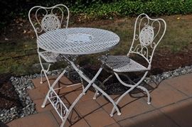 White folding patio table with 2 chairs