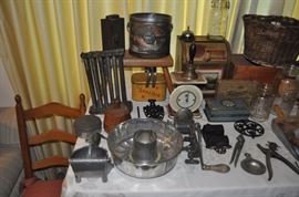 Old milking stool, antique tin 12 candle mold late 18th to early 19th century, antique kitchen items, iron match safe, antique bicycle basket, advertising tins, vintage canning jars, old kitchen utensils, aluminum pitcher, vintage scales, white gloves worn in 1950s marching band, antique butter press, enamelware, antique slaw cutter, desk bell vintage, antique meat grinder, old school bell, small pine spice chests, primitive sugar bucket Firkin, copper and brass pots and buckets