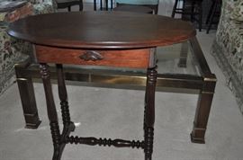 American oval table with single drawer
