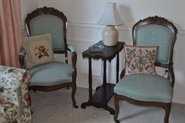 American Victorian walnut gentlemen’s arm chair upholstered in blue matching lady’s chair circa 1875, American rectangular table with lower 'shelf', American Victorian walnut ladies’ chair upholstered in blue matching gentleman’s chair circa 1875