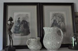Framed fashion pictures, wooden statue, antique pitchers, miniature clock with cloche
