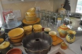Glass jars, dinnerware, bundt pan, goblets, creamers, sugars, pitchers, kitchenware