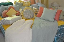 King sized mattress and box spring, Bates twin spread, duvets, vintage feather pillows, feather bed, down comforter, assorted pillows, blankets, sheet sets