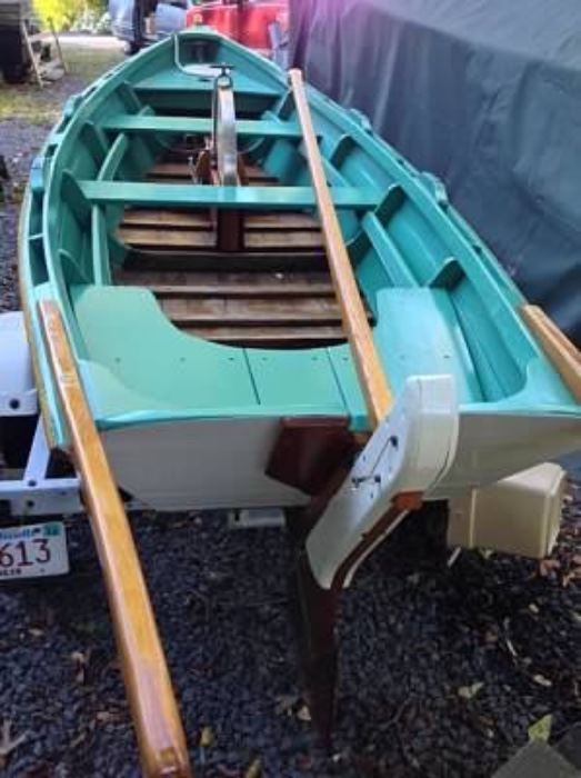    Amesbury/Lowell built. Designed by Pete Culler. 
14 foot lapstrake skiff. Wheelbarrow Boat. Row, sail, launch from a beach. 
