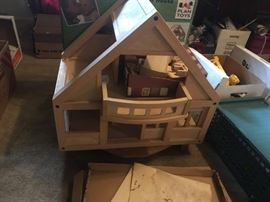#79 Plan Toys wood doll house w/ furniture, 25" tall, $70
