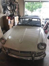 1967 Triumph car with 1966 racing motor mounted but will come with the orginal 1967 motor, along with lots of extra parts. It has excellent top no tears, no rust on the floors, is not running right now. It has all of it's parts. Needs a new home with someone who wants to fix it back up. 
$8000 for it all.
