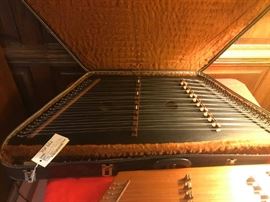 #60 Dulcimer dusty string black in case, $325
