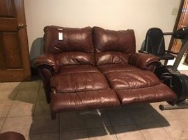 #102 Brown leather rocking/recliner love seat, 68" long, $200